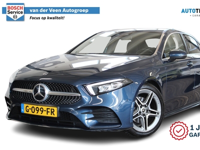 MERCEDES A-KLASSE 180 136pk Business Solution AMG Automaat | Incl. 1 jaar Garantie | 1e eigenaar | Dealer onderhouden | Origineel Nederlands | Stoelverwarming | Half leder / alcantara | DAB | Zwarte hemel | 18