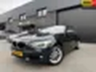 BMW 1-serie 118i Business 2E EIGENAAR 12MND GARANTIE AUTOMAAT LEER LMV XENON NAVI CR