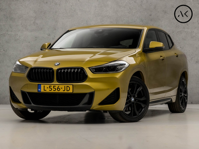 BMW X2 xDrive25e M-Pakket High Executive 221Pk Automaat (KUIPSTOELEN, APPLE CARPLAY, GROOT NAVI, HEAD-UP DISPLAY, MEMORY SEATS, SFEERVERLICHTING, LEDER, GETINT GLAS, ADAPTIVE CRUISE, STOELVERWARMING, ZWART HEMEL, NIEUWSTAAT)