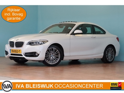 BMW 2-SERIE Coupé 218i High Executive Automaat | NAVI | PDC V+A | SCHUIF/KANTELDAK | LEER | STOELVERW |