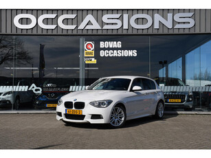 BMW 1-serie 114i Business+ NAVIGATIE/ LEDER/ LM 17/ PDC