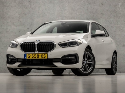 BMW 1-serie 118i Sport Automaat (DRAADLOOS CARPLAY, GROOT NAVI, HARMAN/KARDON, STOELVERWARMING, LEDER, SPORTSTOELEN, SFEERVERLICHTING, CRUISE, NIEUWSTAAT)