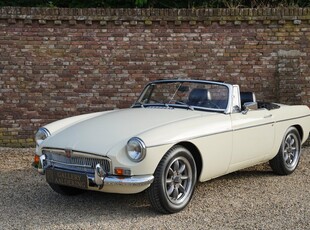 MG B Tourer Old English White over black leather, Converted from Tourer to Roadster (chrome bumper), Nice upgrades such as SU carburetors - Mohair hood - Brake booster - Stainless steel exhaust system, The excellent driving qualities of the Tourer but the