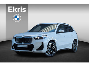 BMW iX1 eDrive20 | M Sportpakket | Premium Pack | Getint Glas | Verwarmbare Voorstoelen | Camera | 19'' LMV