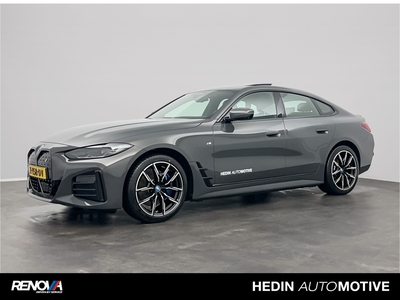 BMW I4 eDrive35 High Executive 70 kWh | M Sportpakket Pro | BMW Personal CoPilot Pack | Stuurwielrand verwarmd | Comfort Access | Elektrisch bediend glazen schuif-/kanteldak | HiFi System | Draadloos oplaadstation | BMW Live Coc