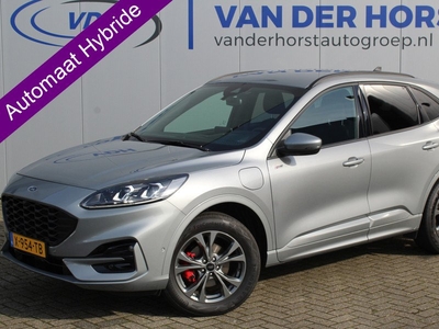 Ford Kuga 2.5-225pk PHEV ST-Line X. Slechts 7.350km ! Fabrieksgarantie t/m 23-04-2027 ! Volautm. airco, stoel-, stuur- en voorraam verwarming, camera v+a, elektr. best. stoel en achterklep, side- en lane assist, adaptive cruise cntrl , LM wielen, B&Ometal