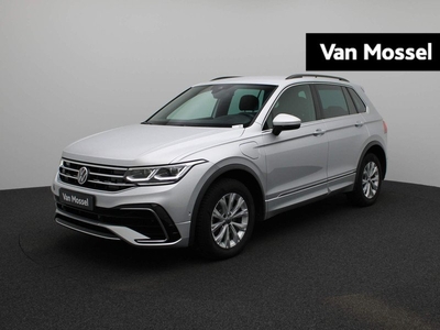 Volkswagen Tiguan 1.4 TSI eHybrid R-Line Business 245 PK | R-Line exterieur | R-Line interieur | Automaat | Navigatie | Camera | Trekhaak | Adaptive Cruise Control | Climate Control | Stoelverwarming | Parkeersensoren | Virtual Cockpit | LED | Lichtmetale