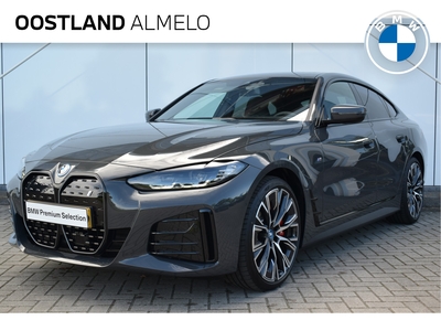 BMW I4 eDrive40 High Executive M Sport 84 kWh / Schuif-kanteldak / M Sportstoelen / Active Cruise Control / Comfort Access / Harman Kardon / Parking Assistant