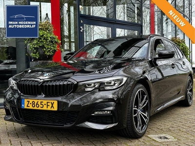 BMW 3-serie Touring 330e High Executive M-SPORT | DIGITAAL | Schuif-kanteldak | Stoelverw. | DAB | 19 inch