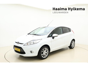 Ford Fiesta 1.25 Titanium | Climate control | Parkeersensoren | Trekhaak | 5 Deuren | Lichtmetalen velgen | Getint glas | Mistlampen voor