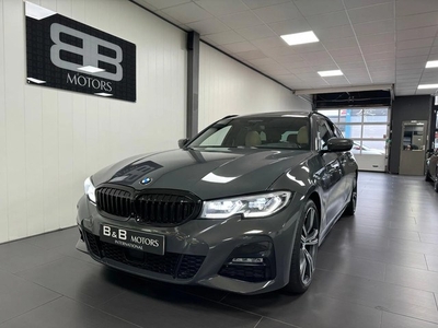 BMW 3 Serie Touring 330i High Executive (bj 2020)