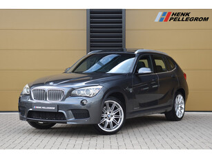 BMW X1 sDrive20i High Executive * M Sportpakket * Panorama dak * Stoelverwarming * PDC * Navigatie Professional *