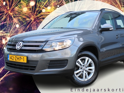 VOLKSWAGEN TIGUAN 1.4 TSI Comfort&Design 123 pk | Incl. 1 jaar Garantie | Clima | Cruise | 16 Inch LMV | Getinte ramen | Centrale deurvergrendeling met afstandsbediening | Elektrische ramen V+A | Elektrisch inklapbare/verwarmde spiegels | Origineel NL auto | NAP | Onder...