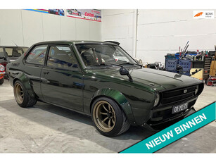 Toyota Corolla KE30 widebody,rolkooi,Bride kuipstoelen,Nardi enz