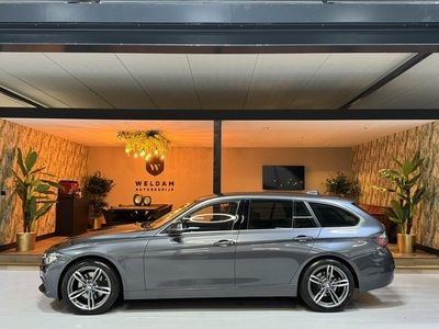 BMW 3-serie Touring 330i xDrive High Executive Garantie