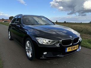 BMW 3 Serie Touring 320i High Executive NAVI/CRUISE/PDC/LEER