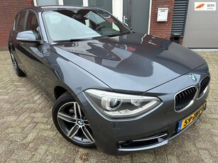 BMW 1-serie 114i Business+ / Leder / Navi / PDC / LED /