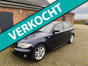 BMW 1-serie 120i Anniversary met leder en navigatie