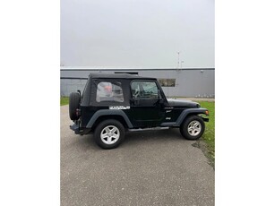 Jeep Wrangler TJ met softtop en hardtop in goede staat