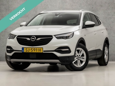 Opel Grandland X 1.2 Turbo Business Executive Automaat (APPLE CARPLAY, NAVIGATIE, GETINT GLAS, TREKHAAK, CLIMATE, LEDER, SPORTSTOELEN, ELEK ACHTERKLEP, PARKEERSENSOREN, NIEUWSTAAT)