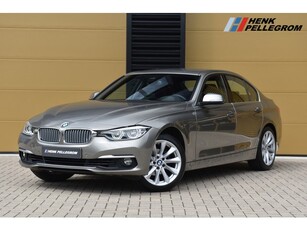 BMW 3-serie 320i Luxury Edition * Navigatie Professional *