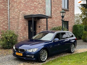 BMW 3-serie Touring 330i xDrive AUT ACC HUD Leder Clima