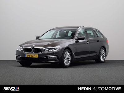 BMW 5-SERIE Touring 520i High Executive | Luxury Line | Panoramadak elektrisch | Navigatiesysteem Professional | Adaptieve LED-koplampen