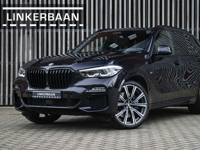 BMW X5 xDrive30d | Individual | M Sport | Panodak | Trekhaak | H&K | Achterasbesturing | 22 inch | NL auto |