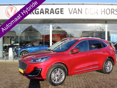 Ford Kuga 2.5-225pk PHEV Vignale. Trekgewicht 1500kg Slechts 5.850km ! Fabrieksgarantie t/m 21-05-2027 ! Lane- en side assist, adaptive cruise cntrl, elektr. verstelb. best. stoel met geheugen, LM wielen, stuur-, stoel- en voorraamverwarming, lederen inte