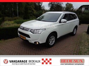 Mitsubishi Outlander 2.0 ClearTec 2WD CVT 7pl Business Edition bij Vakgarage® met 12 maanden Bovag garantie.