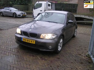 BMW 1-serie 120i High Executive abs lampje brand barst in