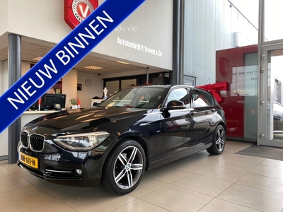 BMW 1-SERIE 116i High Executive,Automaat,Schuifkanteldak,Navigatie,Stoelverwarming.Trekhaak,Achteruitrijsensoren,Climate&Cruisecontrol,Bleutooth met Spraakbediening,17 Inch Lmv