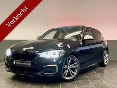 BMW 1-SERIE M140i xDrive High Executive | AKRAPOVIC | FULL | Camera | Dak | Keyless |