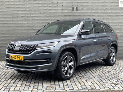 SKODA KODIAQ 1.5 TSI SPORTLINE BUSINESS 7-PERS I AUTOMAAT I TREKHAAK I APPLE/ANDROID I ACHTERUITRIJCAMERA I ALCANTARA I STOELVERWARMING