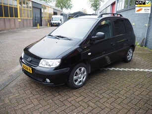 Hyundai Matrix 1.6i Active Joy PDC, 4 seizoenbanden.