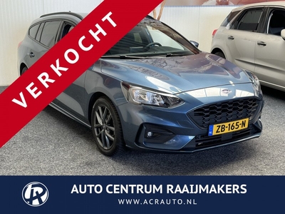 Ford FOCUS Wagon 1.0 EcoBoost ST Line Business NAVIGATIE CRUISE CONTROL APPLE CARPLAY/ANDROID STOEL EN STUURVERWARMING RIJSTROOKSENSOREN UITKLAPBARE TREKHAAK ZEER MOOI !! LOCATIE 3010