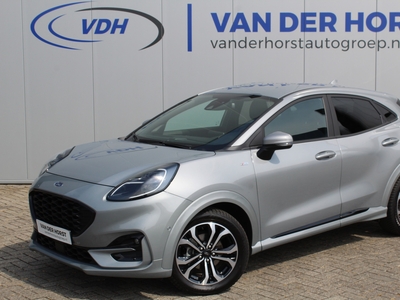 FORD PUMA 1.0-125pk EcoBoost Mild-Hybrid ST-Line X. Zeer luxe Ford Puma ST-Line X ! Adaptive cruise cntrl, metallic lak, volautm. airco, stuur-, stoel- en voorraam verwarming, LM wielen, Isofix, dode hoek ass., camera, parkeerass., navigatie etc., etc.