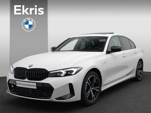 BMW 3 Serie Sedan 320e M Sportpakket Travel Pack Entertainment Pack / Schuifdak / Trekhaak / Harman Kardon / Stuurwiel Verwarmd / 18'' | Showroom Sale