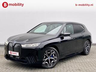 BMW iX xDrive50 High Executive 105 kWh Trekhaak 2500kg | Sportpakket | Harman/Kardon Sound System | Driving Assistant | Parking Assistan Plus | DAB Radio | Massagestoel