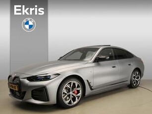 BMW i4 M50 M-Sportpakket / Laserlicht / Leder / Navigatie / Schuifdak / Elektr. zetels / Keyles go / DAB / Harman-kardon sound / Alu 19 inch