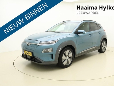 Hyundai Kona EV Premium 64 kWh 100% Elektrisch | Parkeersensor | Camera | Lederen bekleding | Elektrische stoelen | Stoelverwarming | Navigatie | Cruise Control | Voorraad | 1e eigenaar