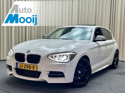 BMW 1-serie M135i M-Performance *Schuif/Kanteldak* Leder / Harman Kardon / Memory seat / Keyless / Xenon / Stoelverwarming / PDC / 19