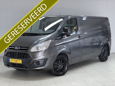 Ford Transit Custom 290 2.2 TDCI L2H1/ MARGE!/ 3-Zitpaatsen voor/ Zij-schuifdeur rechts/ Apple + android/ Lane-Assist./ Voorruitverw./ Navi/ Airco/ Cruise/ Elek. pakket/ Bluetooth/ Armsteun/ 16'' LMV/ Mistl./ PDC V+A.