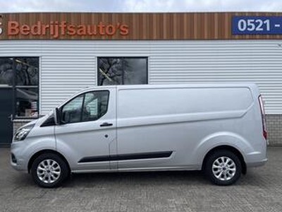 Ford TRANSIT CUSTOM 320 2.0 TDCI 130pk automaat L2H1 Trend / rijklaar ? 19.950 ex btw / lease vanaf ? 431 / zilver metallic / airco / cruise / navi / lichtmetalen velgen / stoelverwarming !