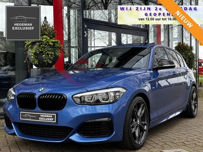 BMW 1-serie M140i | Schuif-kanteldak | Harman Kardon | Stoelverwarming | Climate | Cruise | PDC | RWD