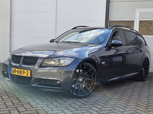 BMW 3 Serie Touring 335i High Executive / (Lees