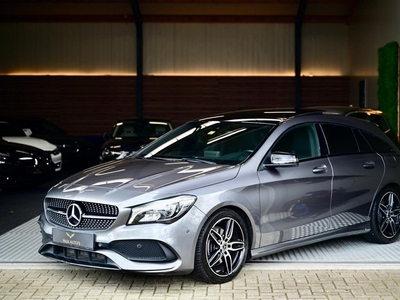 Mercedes-Benz CLA-klasse Shooting Brake 180 - AMG - Panoramadak - Stoelverwarming - Achteruitrijcamera - Xenon - Cruise Control -