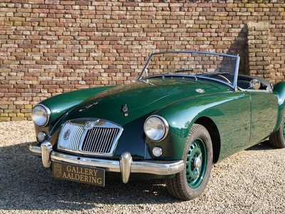 MG A Twin Cam Roadster Restored condition, Equipment includes 15″ knock-off steel wheels - green leather low-back bucket seats, Subject to a body off restoration in the late '90s, British Racing Green over dark green interior, One of only 2111 Twin-