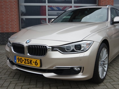 BMW 3 Serie Touring 328i High Executive ketting nieuw