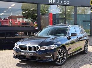 BMW 3-SERIE Touring 330e High Executive Sport|Pano|HUD|Laser|H&K